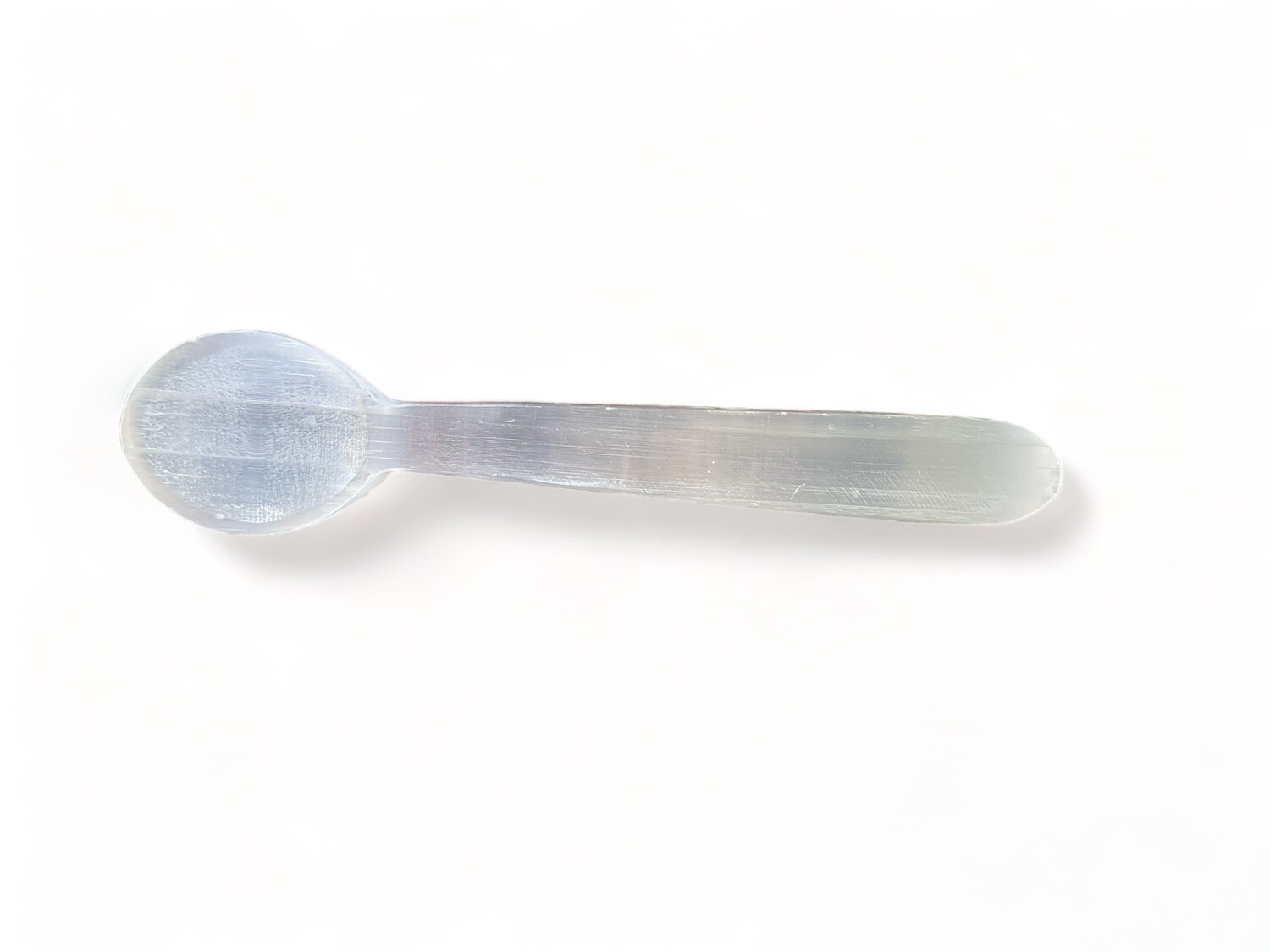 Image of 6&quot; Selenite Altar Spoon with a sleek design, ideal for enhancing rituals and spiritual practices. Its elegant craftsmanship makes it a perfect tool for collectors.