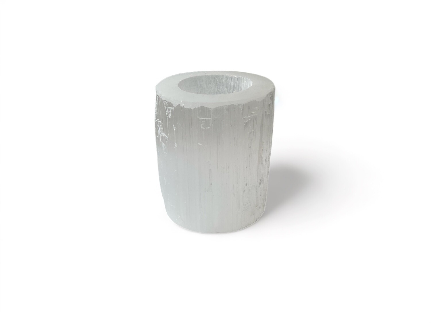 Photo of Selenite candle holder with a soft, natural glow that adds elegance and tranquility to any space. Ideal for creating a serene ambiance and enhancing home décor.