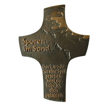 BRONZE CROSS TRACES IN THE SAND
