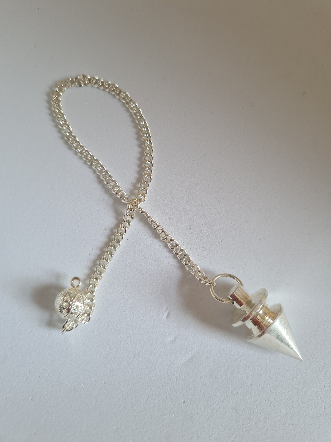 Pendel met zilver metaal