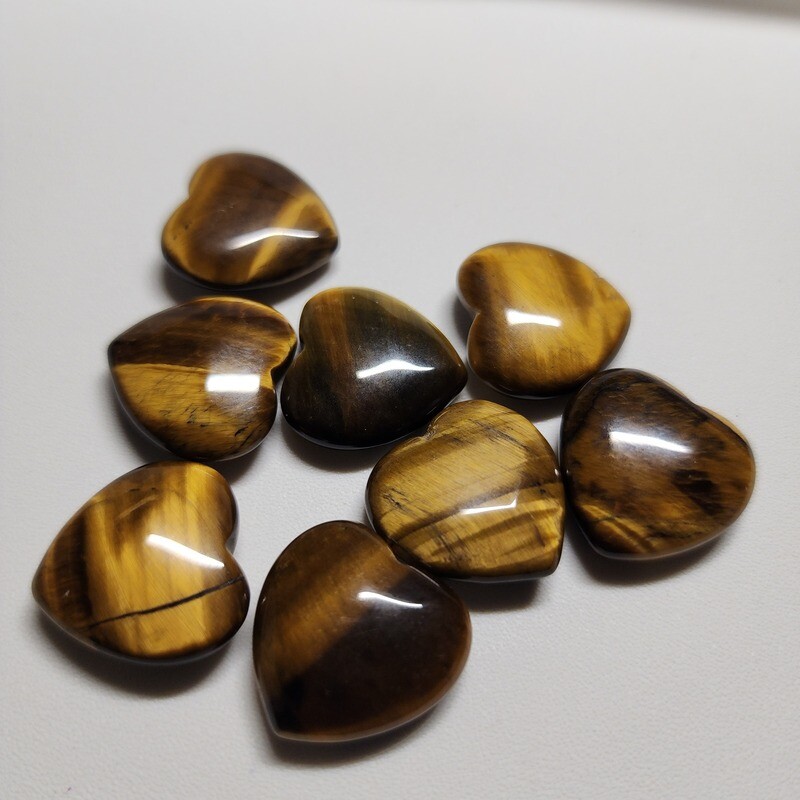 Unwrapped tigers eye heart stone