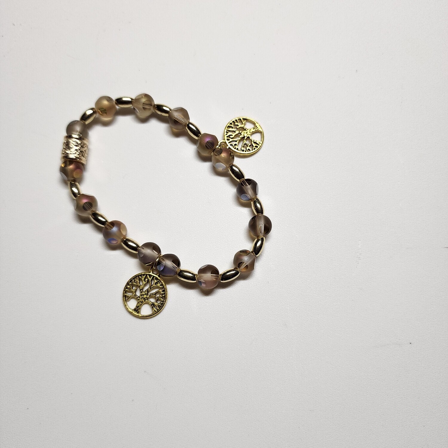Yellow bracelet with tree of life charms