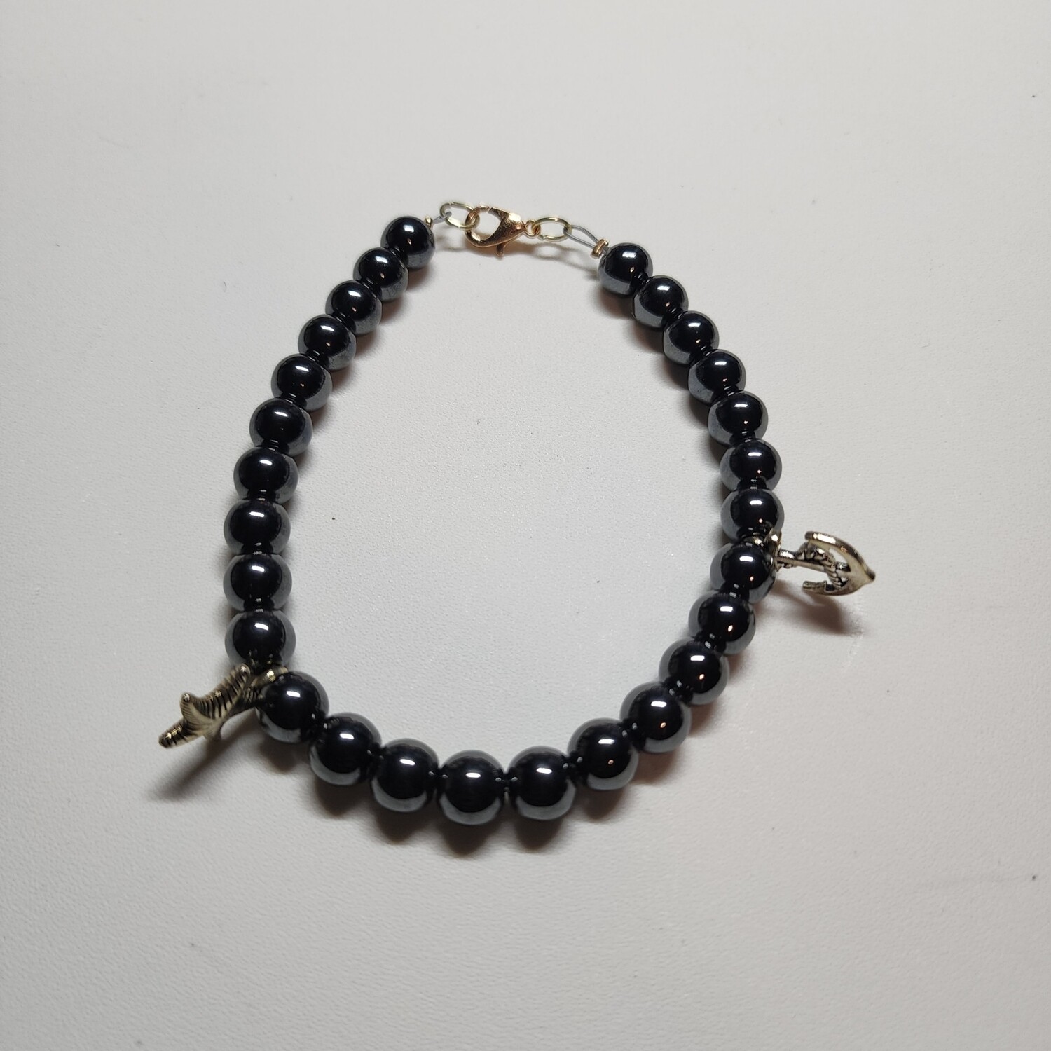 Black hematite with charms 