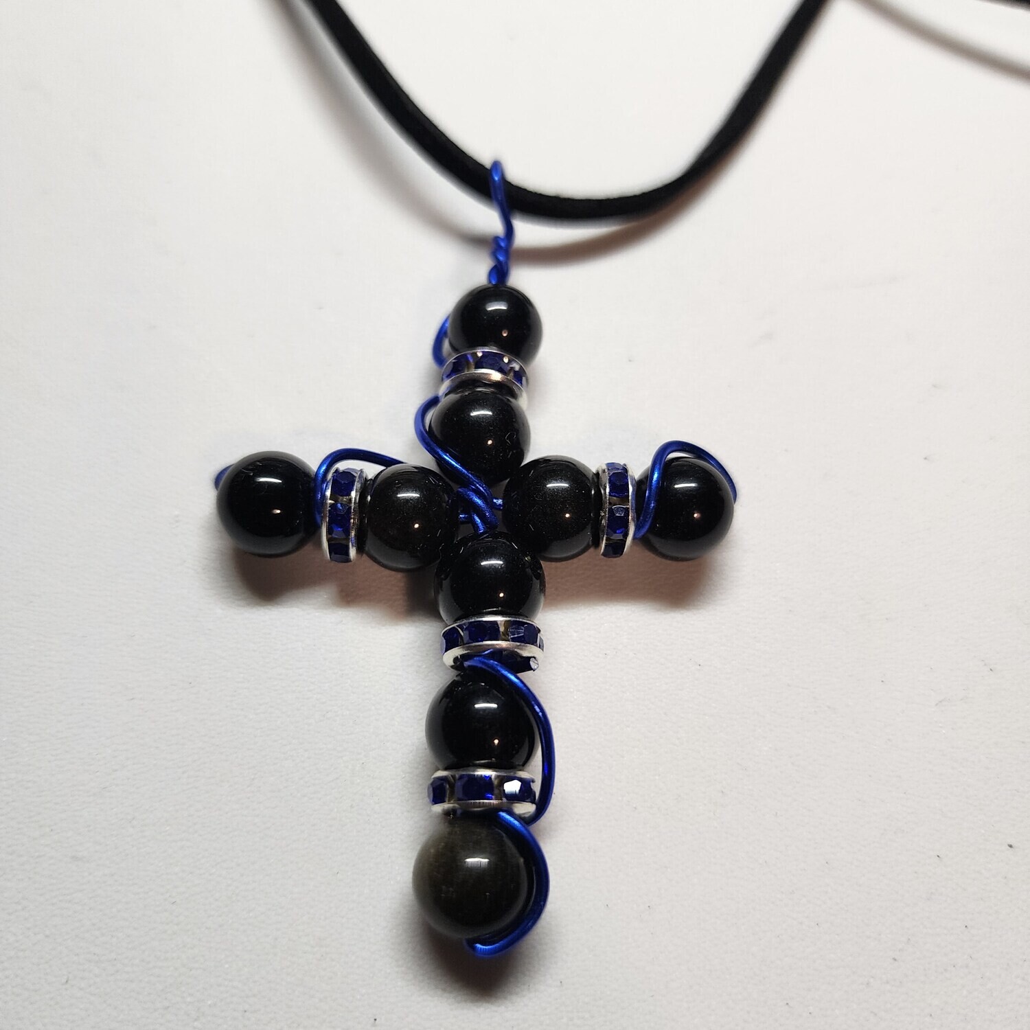 Obsidian cross with blue accents Obsidian cross with blue accents