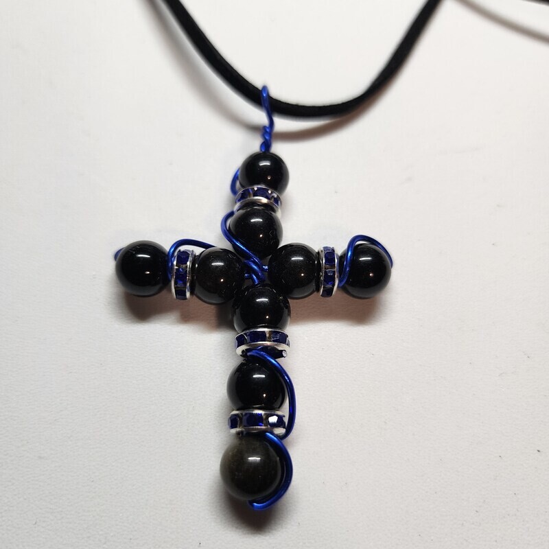 Obsidian cross with blue accents