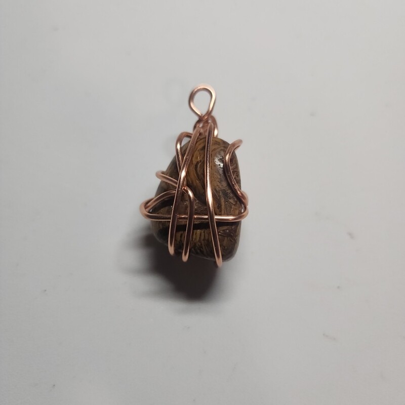 Bronzite wrapped stone