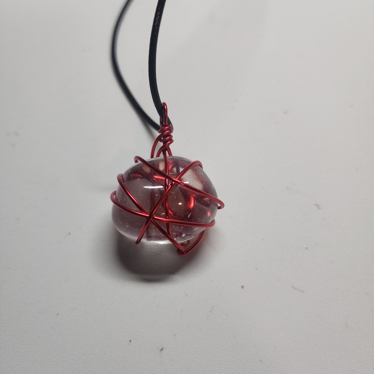 Clear quartz crystal wrapped