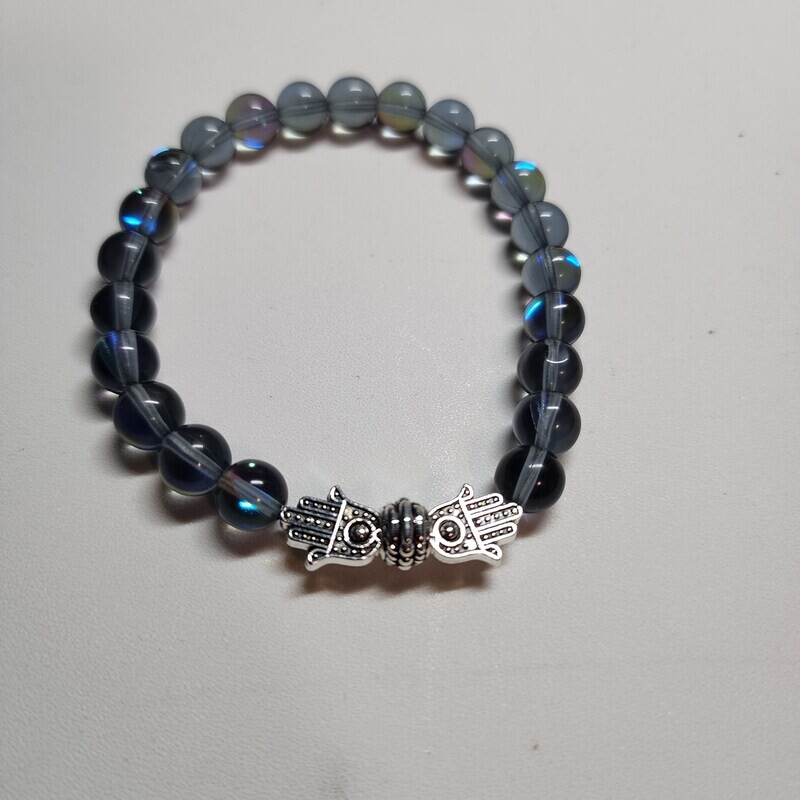 Clear blue bracelet with hamsa hands