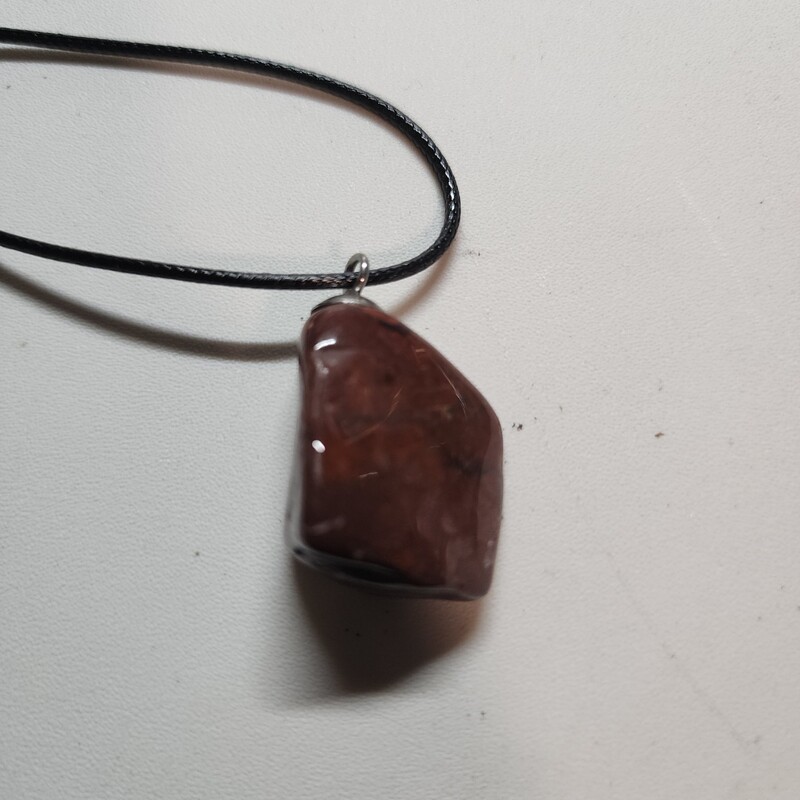 Red jasper tumbled stone
