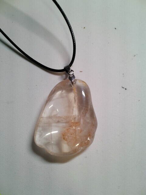 Fire quartz crystal with bale attachment