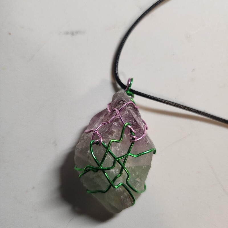 Fluorite wrapped in green and pink wire