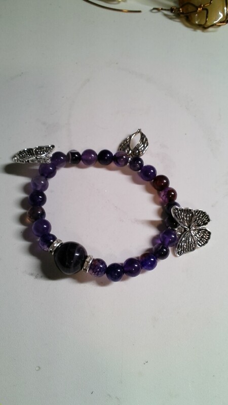 Amethyst bracelet with charms