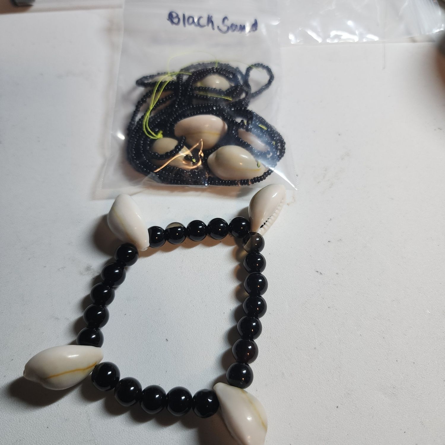 Black sand waist bead and bracelet set with shells