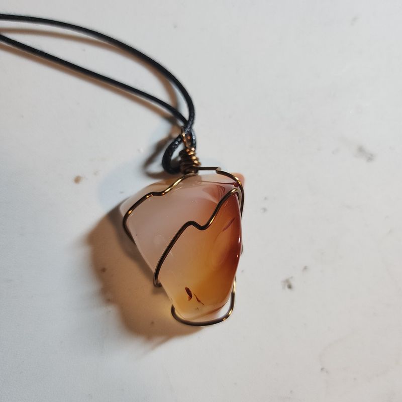 Carnelian crystal wrapped in bronze wire