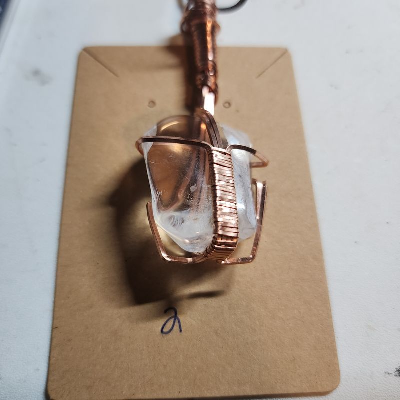 Clear quartz in copper wire
