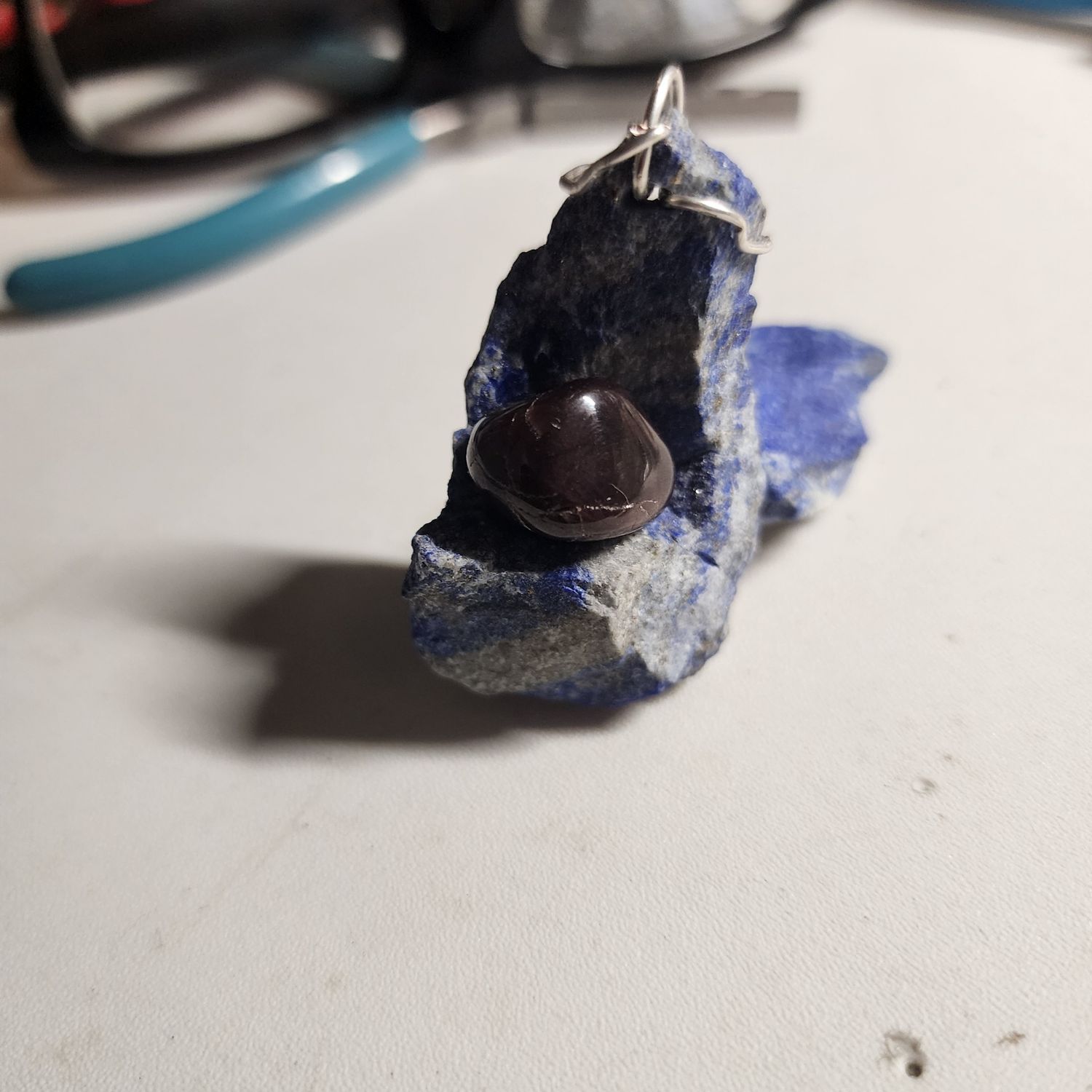 Lapis lazuli rough stone with red garnet tumbled
