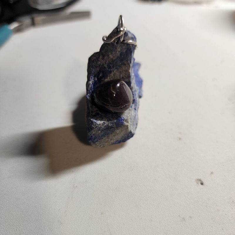 Lapis lazuli rough stone with red garnet tumbled