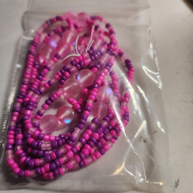 Bubble gum colored waist bead with pink cat eye