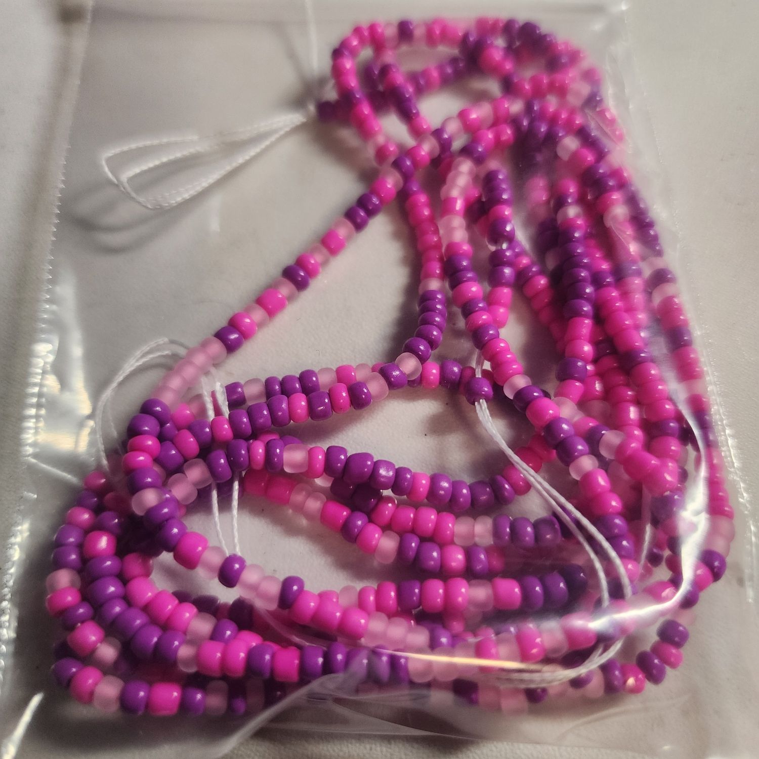 Bubble gum colored waist bead
