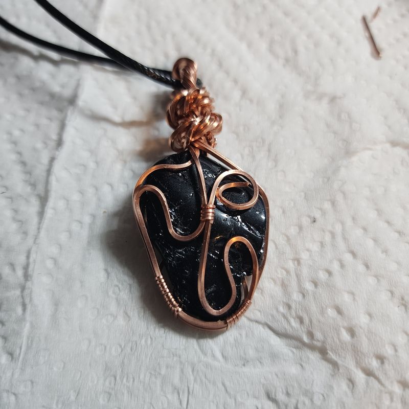 Black tourmaline wrapped in copper wire
