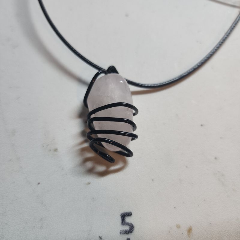Rose Quartz in black wire cage (small) 