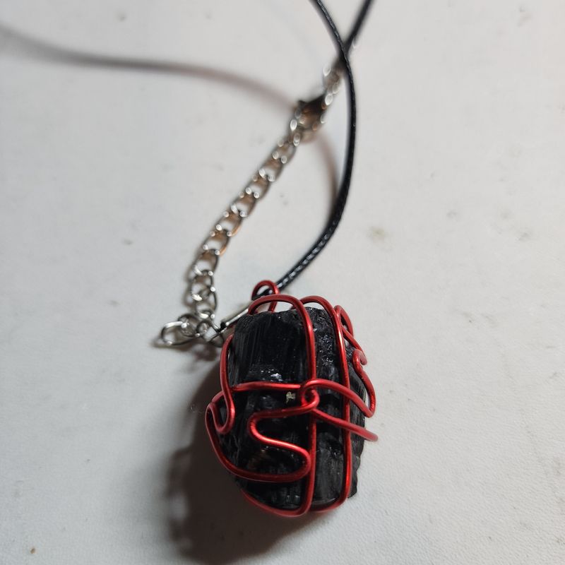 Black tourmaline wrapped in red wire