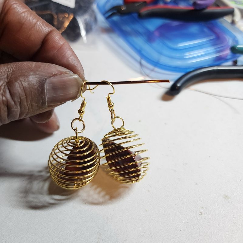 Red jasper stone earrings in gold cage