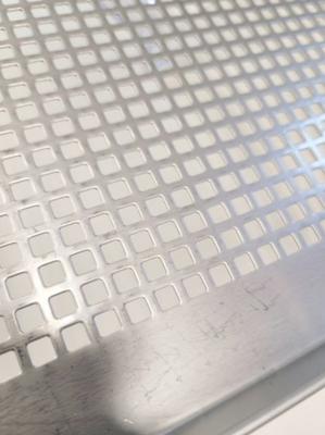 KALINDRA | Pizza. Perforated tray in 304 stainless steel. Holes measure 5 x 5 mm