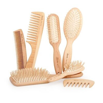 Natural wooden combs and brushes. Kalindra cutlery