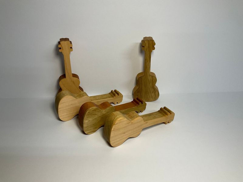 Ukulele shaped musical shakers