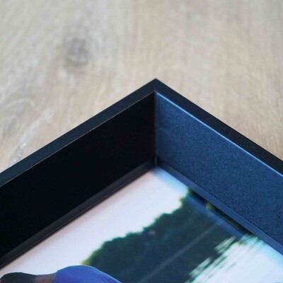 Black window photo frame for 8 x 10 inch photos in portrait or landscape orientation.