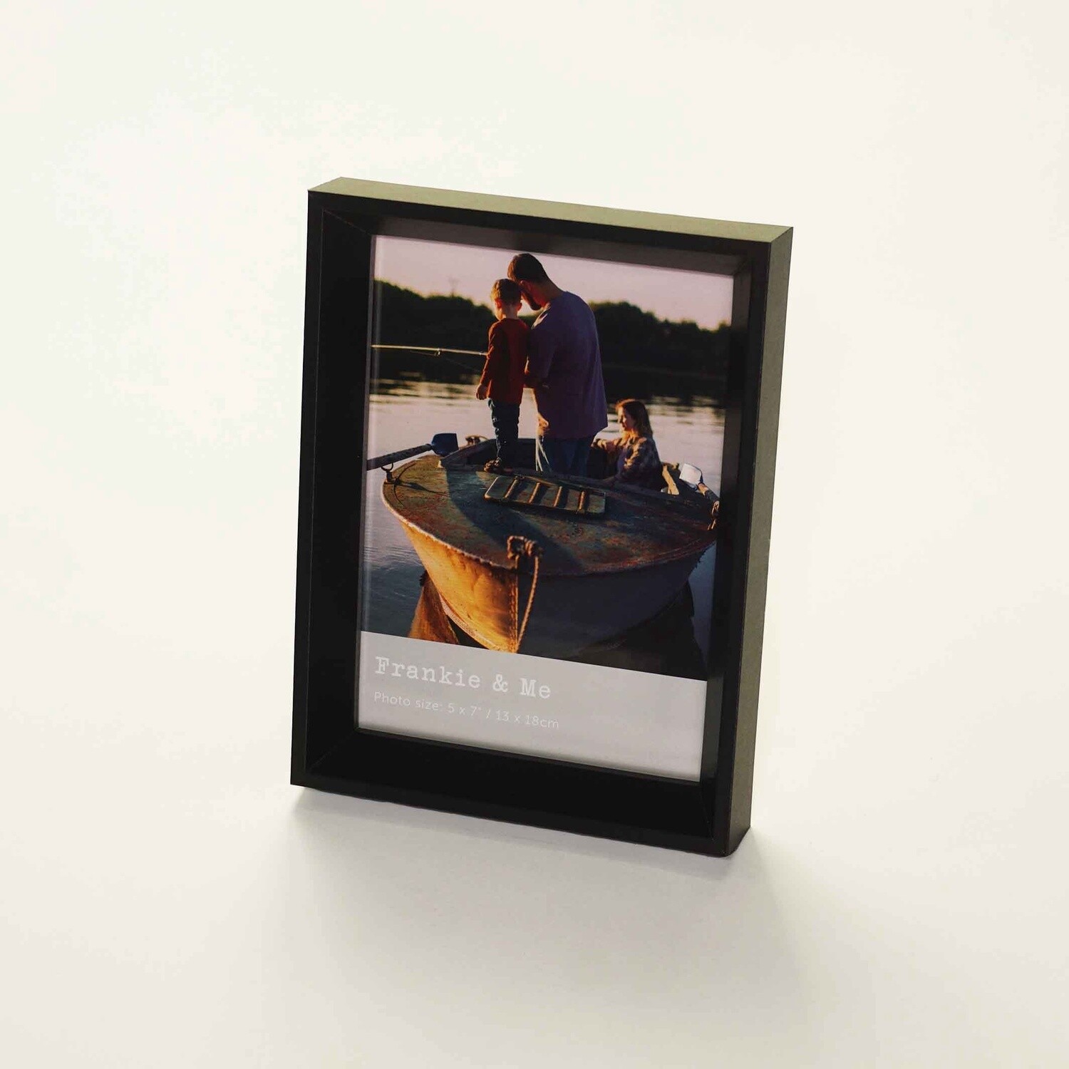 Window photo frame with black finish for 5 x 7 inch photos.