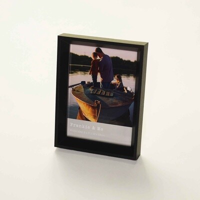 Window photo frame with black finish for 5 x 7 inch photos.