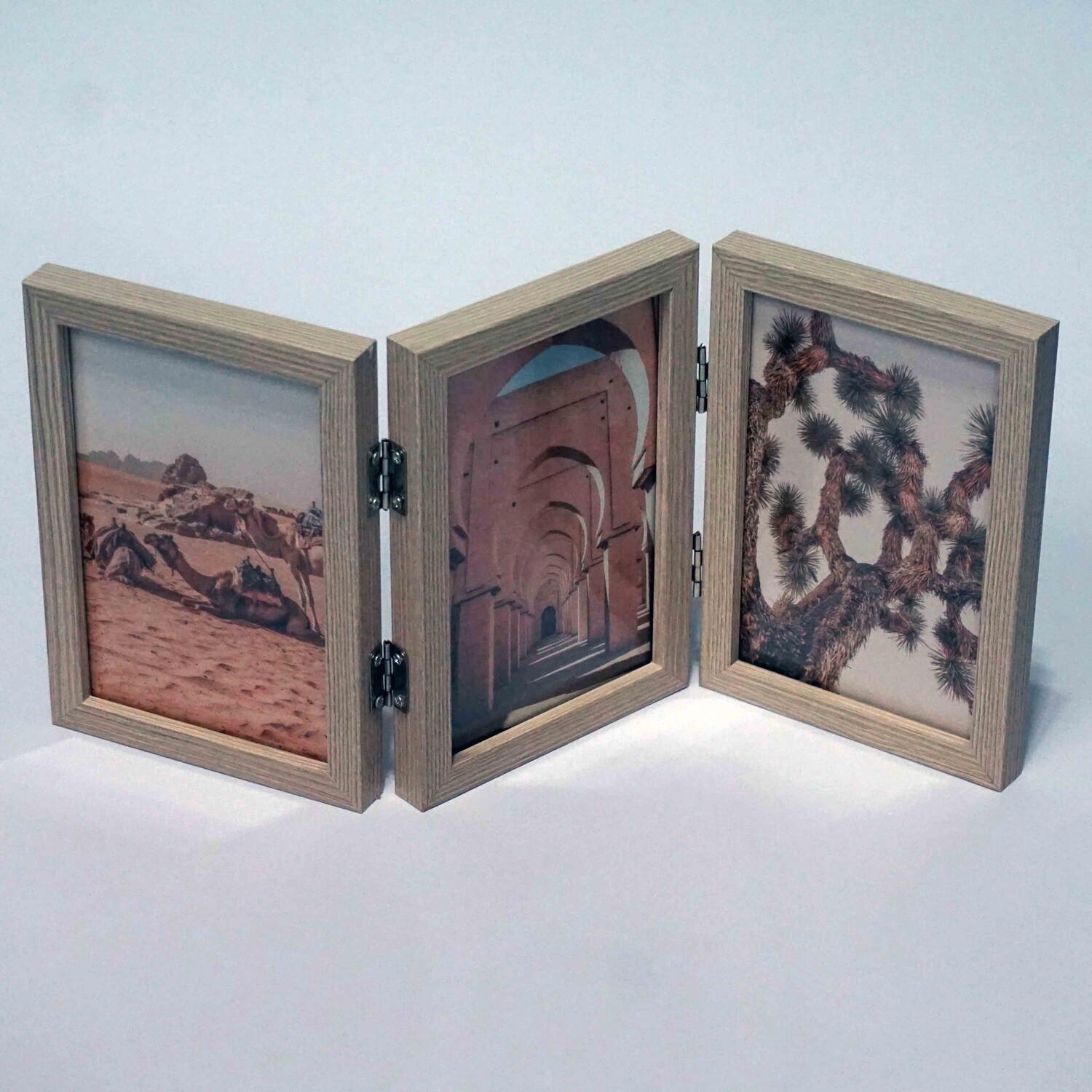 Hinged photo frame for 3 x 6x4 inch photos with oak finish.