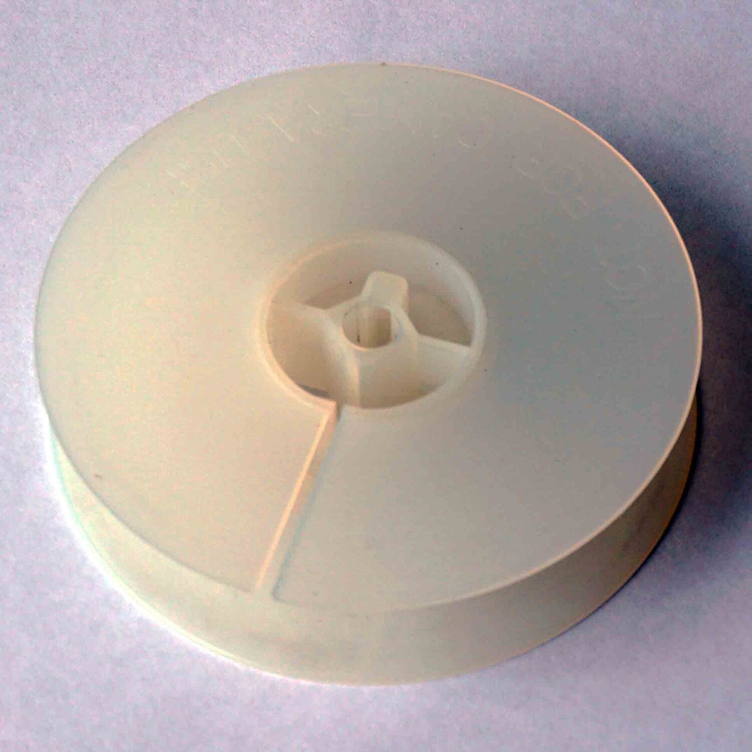 16mm film reel for 100ft of 16mm film.