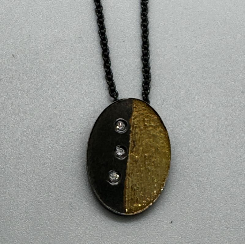 Keleher Necklace Black and Gold Geometric Oval Verticle