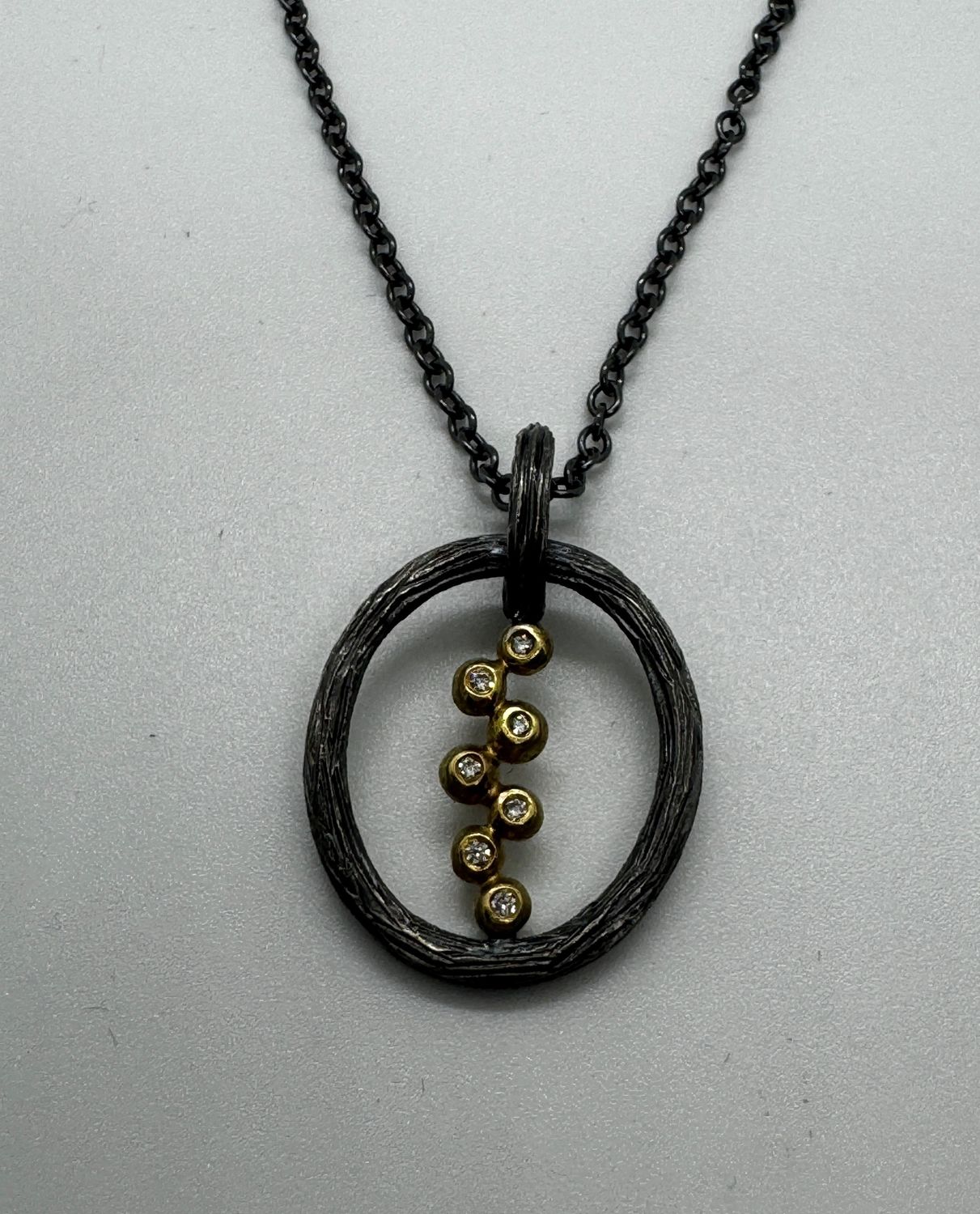 Keleher Necklace Black and Gold Nest