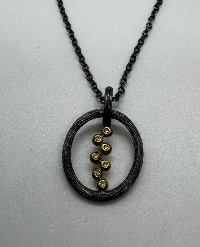 Keleher Necklace Black and Gold Nest