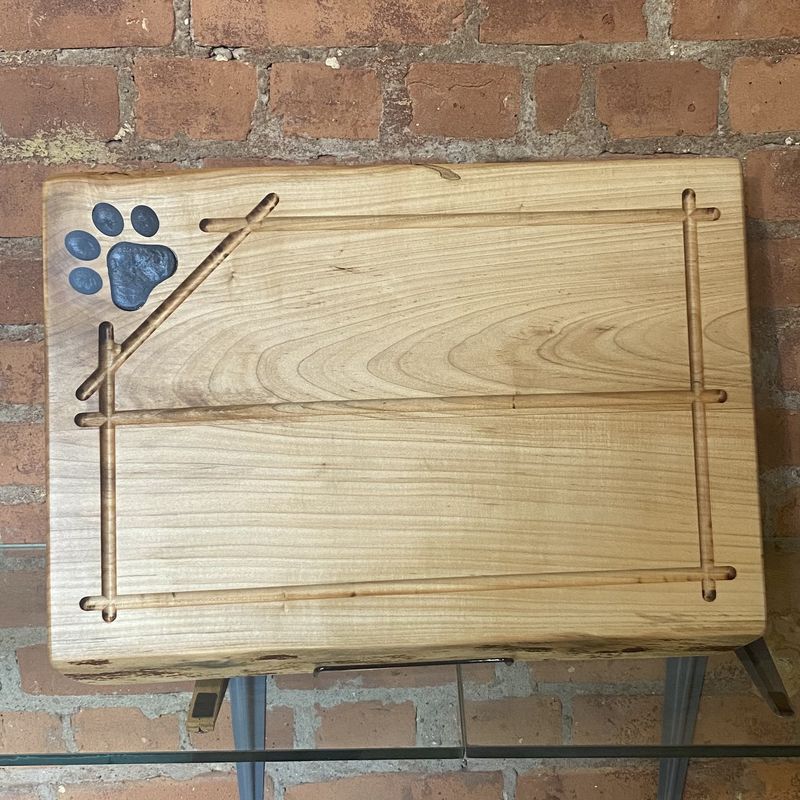 On The Edge Paw Print Cutting Board