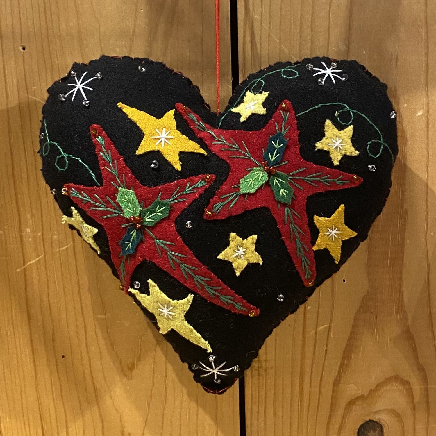 Promising Black Star w/2 Red &amp; Yellow Stars