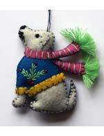 Promising Ornament Dog w/blue Coat and Pink Scarf