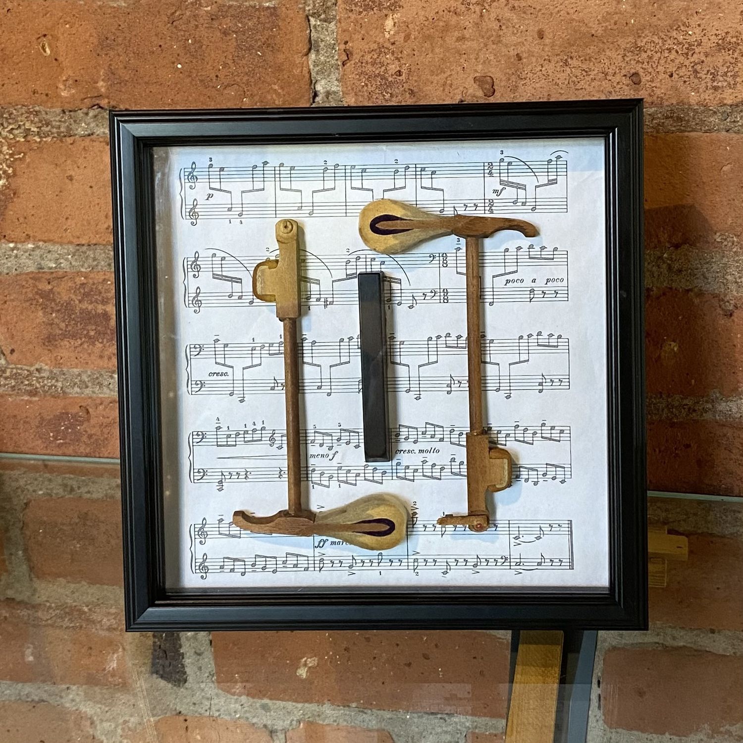 Angerame Framed Two Hammers and Black Piano Key