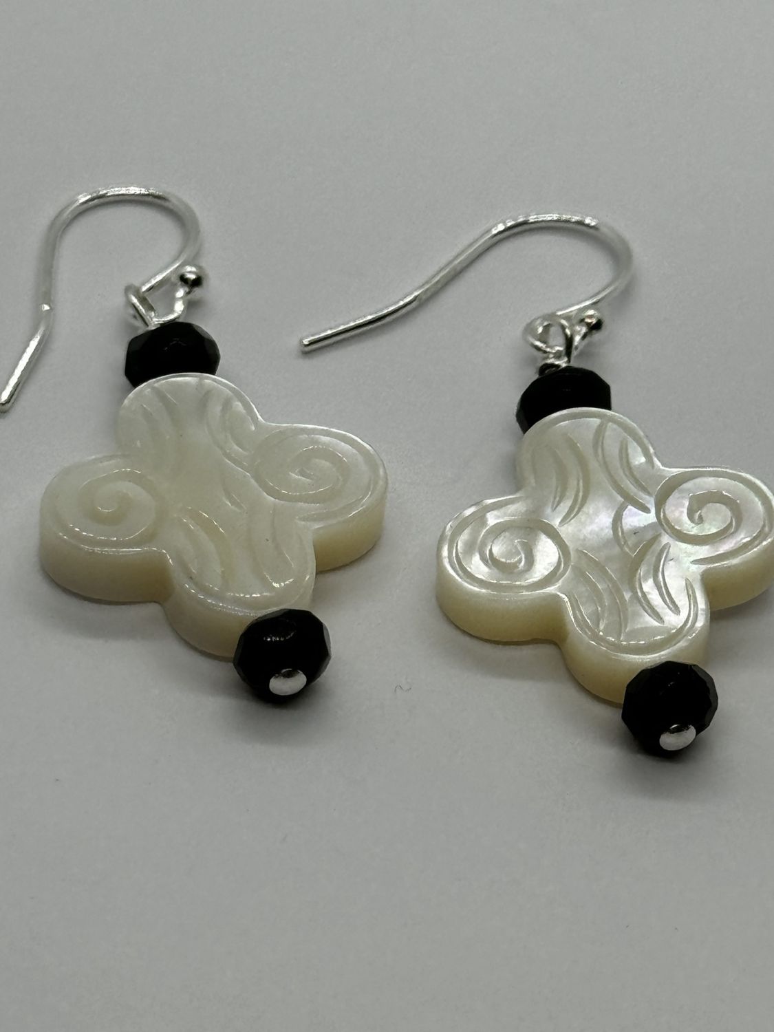 Trueworthy Earrings Mother Of Pearl Carved Flower with Black Onyx