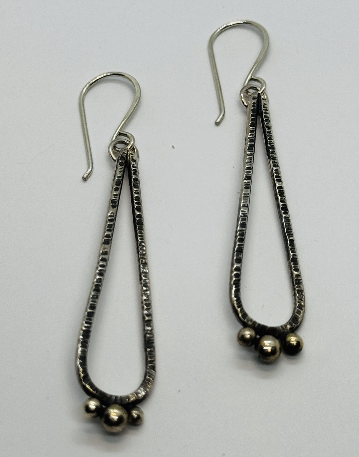 O&#39;Brien Earring Long Skinny Hammered Silver Teardrops W/Three ball Appliques