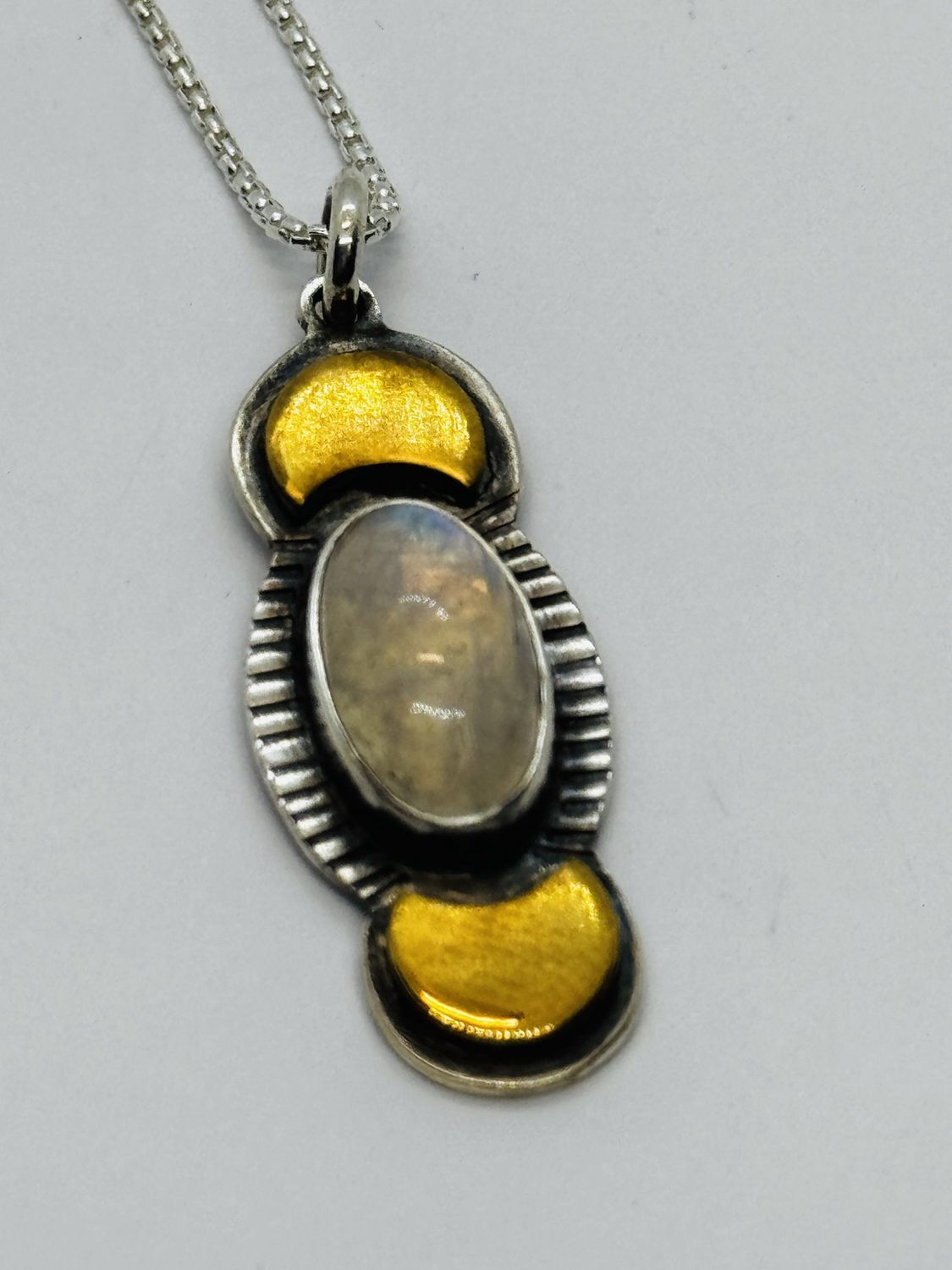 O&#39;Brien Necklace Stamped Silver backplate with Oval Moonstone and 2 Brass Crescent Moons