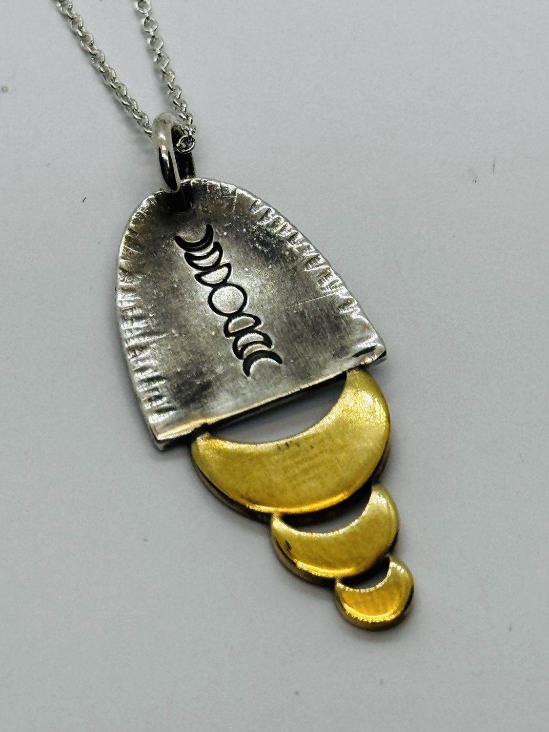 O&#39;Brien Necklace Silver Half Oval Stamped Moon Phase and 3 Graduated Brass Cresent Moons