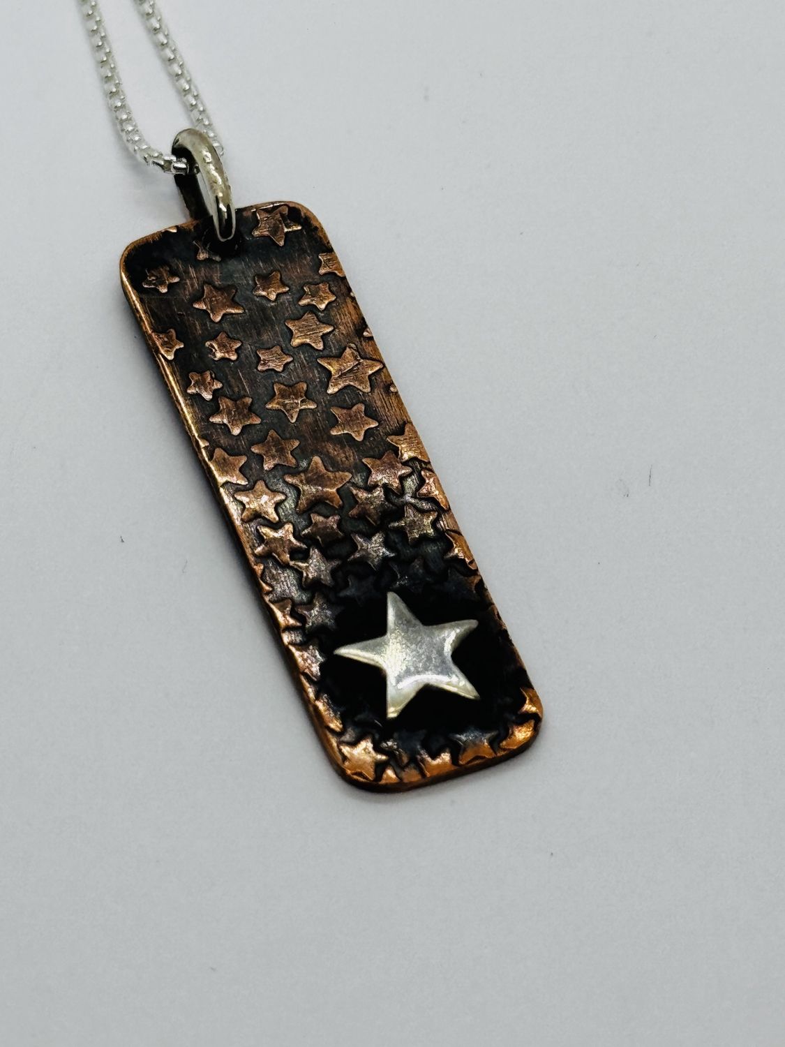 O&#39;Brien Necklace Roll Print Stars on Copper with Flat Silver Star Applique