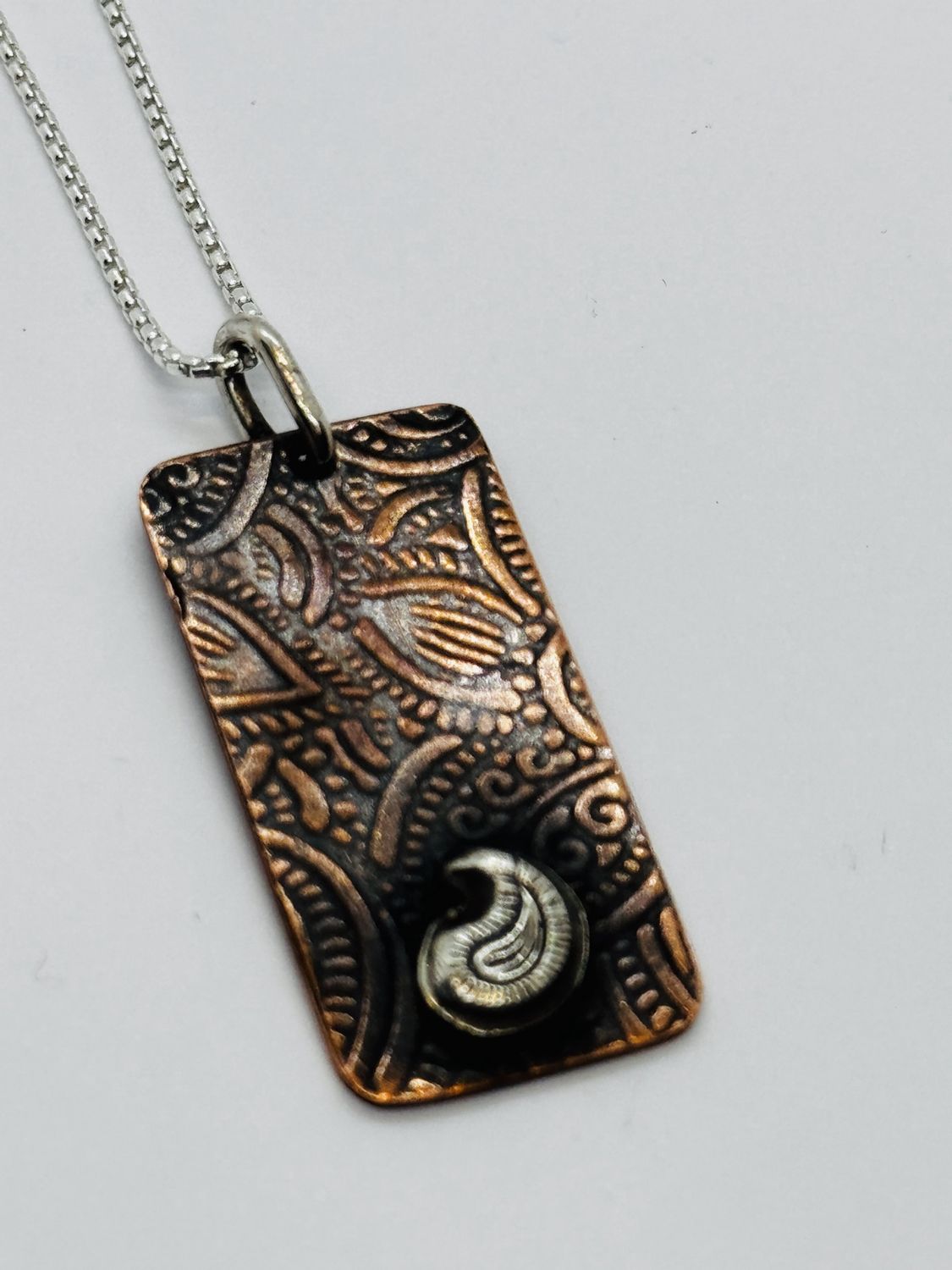 O&#39;Brien Necklace Roll Printed Copper Rectangle with Zentangle pattern and Sterling Silver Paisley Applique