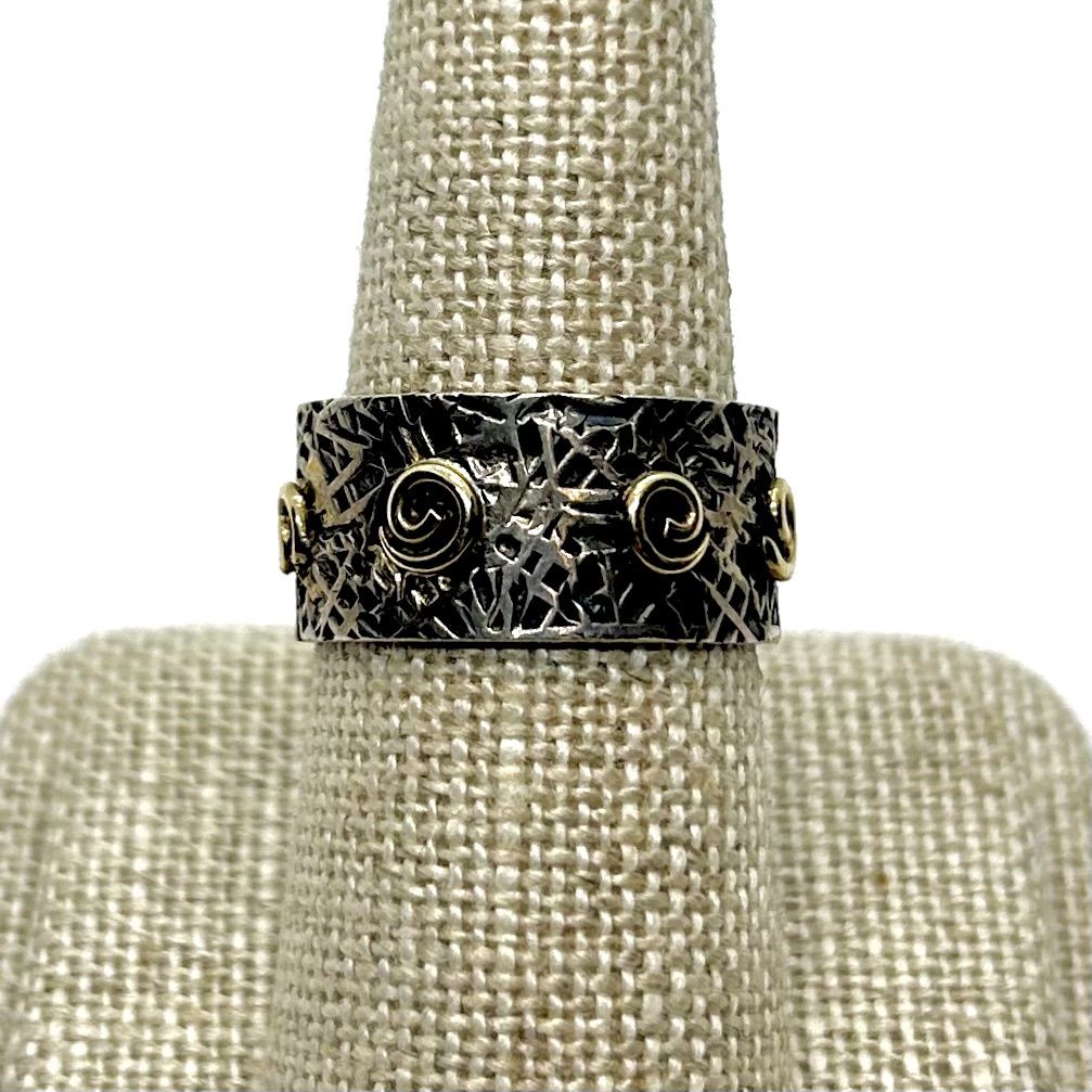 Otter Ring Stamped SS Band w/ Gold Swirls Size 7 Wide