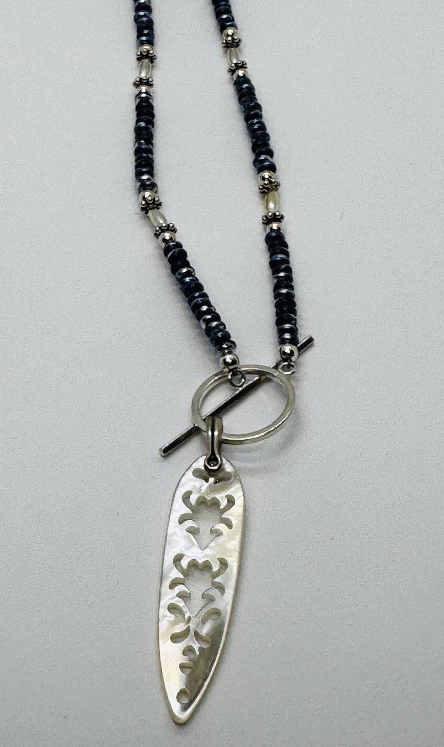 Estancia Necklace Carved Mother Of Pearl and Mirror Denim Czech Glass Beads